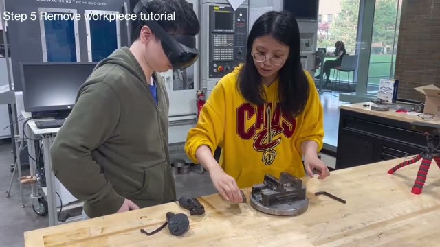AR-based Human–AI Teaming in CNC Training